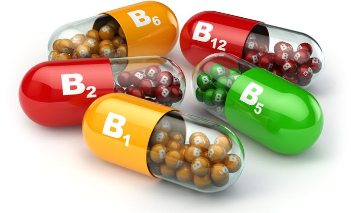 vitamin b. capsules b1 b2 b6 b12 on white isolated background. 3d
